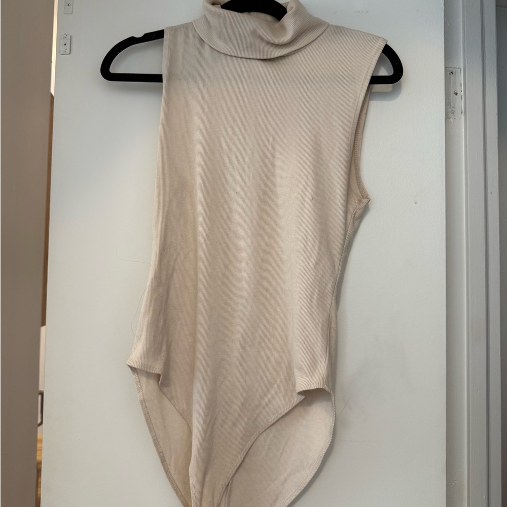 Sleeveless Cream Turtleneck Top